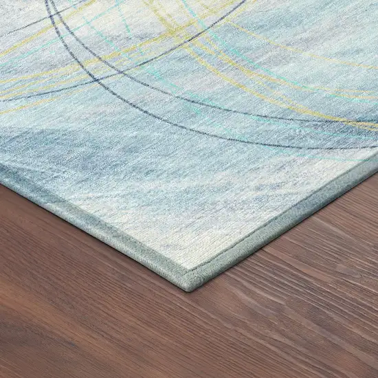 Sky Blue Gold And Ivory Abstract Washable Indoor Outdoor Area Rug Photo 9