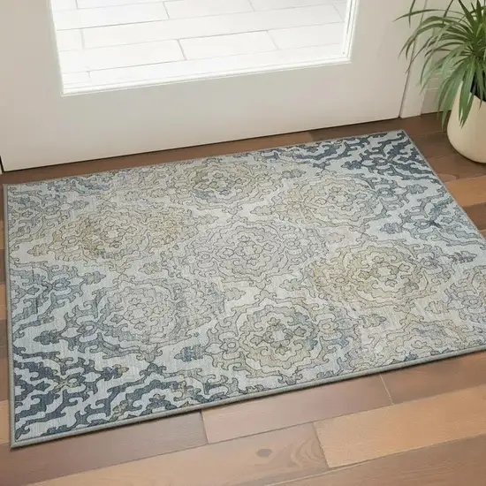 Sky Blue Gold And Ivory Medallion Washable Area Rug With UV Protection Photo 1