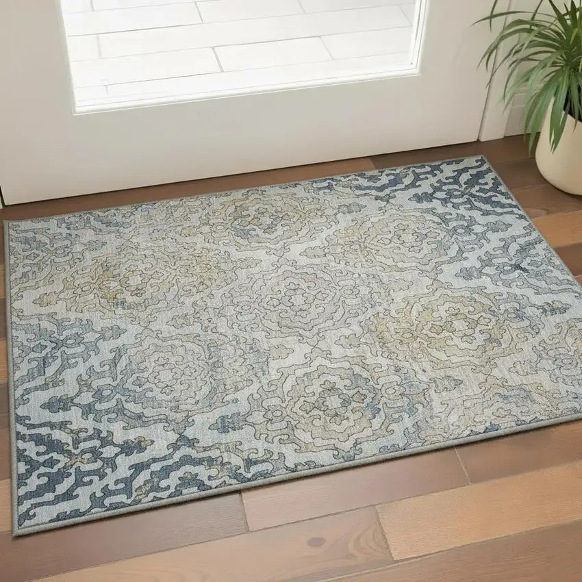 Sky Blue Gold And Ivory Medallion Washable Area Rug With UV Protection Photo 1
