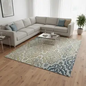 Photo of Sky Blue Gold And Ivory Medallion Washable Area Rug With UV Protection