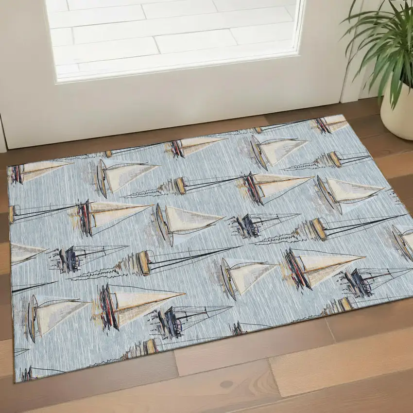 Sky Blue Gold And Ivory Nautical Washable Area Rug With UV Protection Photo 1