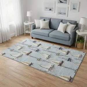 Photo of Sky Blue Gold And Ivory Nautical Washable Area Rug With UV Protection