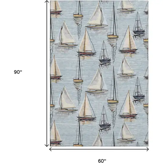 Sky Blue Gold And Ivory Nautical Washable Area Rug With UV Protection Photo 3