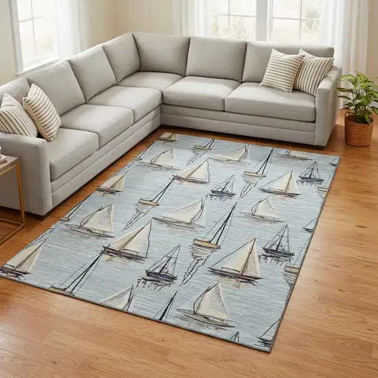 Sky Blue Gold And Ivory Nautical Washable Area Rug With UV Protection Photo 1