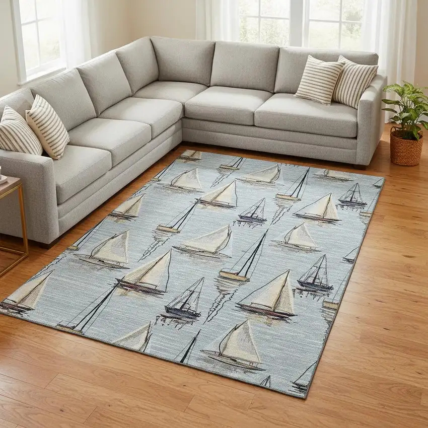 Sky Blue Gold And Ivory Nautical Washable Area Rug With UV Protection Photo 1
