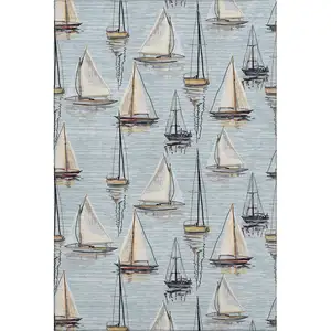 Photo of Sky Blue Gold And Ivory Nautical Washable Area Rug With UV Protection