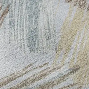 Photo of Sky Blue Gold And Taupe Striped Washable Area Rug With UV Protection