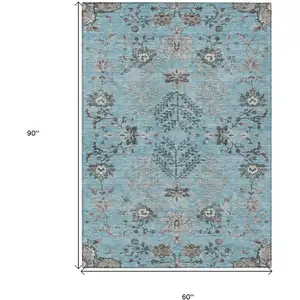 Photo of Sky Blue Gray And Charcoal Floral Washable Indoor Outdoor Area Rug
