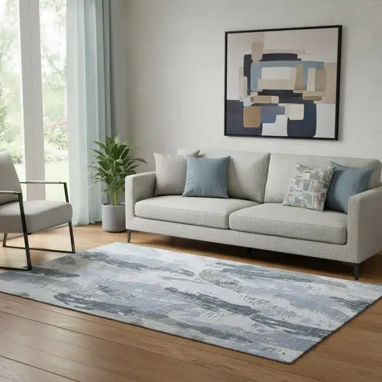 Sky Blue Gray And Ivory Abstract Washable Area Rug With UV Protection Photo 2