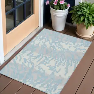 Photo of Sky Blue Gray And Ivory Animal Print Washable Indoor Outdoor Area Rug