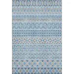 Photo of Sky Blue Gray And Ivory Ikat Washable Area Rug With UV Protection