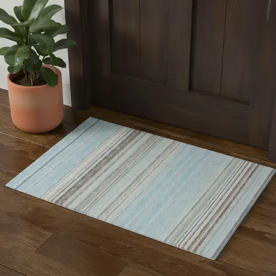 Sky Blue Gray And Ivory Striped Washable Area Rug With UV Protection Photo 1