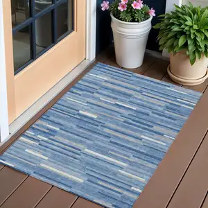 Photo of Sky Blue Gray And Ivory Striped Washable Indoor Outdoor Area Rug