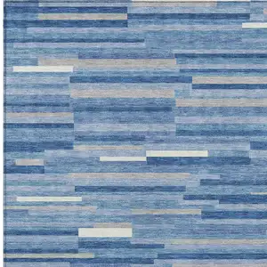 Photo of Sky Blue Gray And Ivory Striped Washable Indoor Outdoor Area Rug