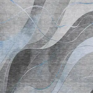 Photo of Sky Blue Gray And Silver Abstract Washable Area Rug With UV Protection