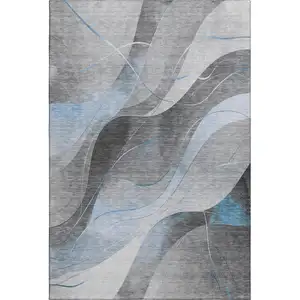 Photo of Sky Blue Gray And Silver Abstract Washable Area Rug With UV Protection