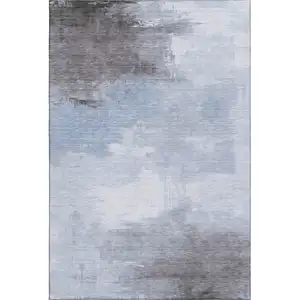 Photo of Sky Blue Gray And Silver Abstract Washable Area Rug With UV Protection