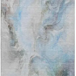 Photo of Sky Blue Gray And Silver Abstract Washable Area Rug With UV Protection