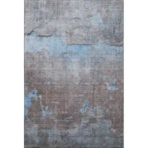 Photo of Sky Blue Gray And Silver Abstract Washable Area Rug With UV Protection