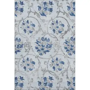 Photo of Sky Blue Gray And Silver Floral Washable Area Rug With UV Protection