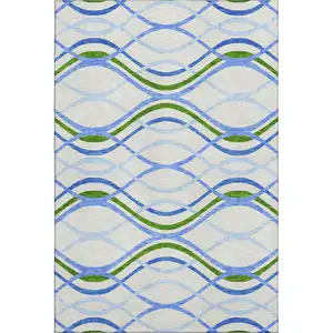 Photo of Sky Blue Green And Ivory Abstract Washable Area Rug With UV Protection