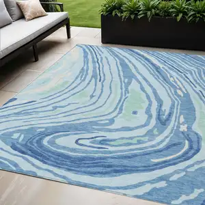 Photo of Sky Blue Green And Ivory Abstract Washable Indoor Outdoor Area Rug