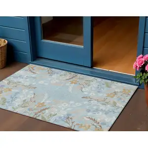 Photo of Sky Blue Ivory And Brown Floral Washable Indoor Outdoor Area Rug