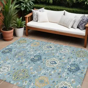 Photo of Sky Blue Ivory And Gold Damask Washable Indoor Outdoor Area Rug