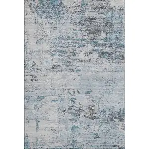 Photo of Sky Blue Ivory And Gray Abstract Washable Area Rug With UV Protection