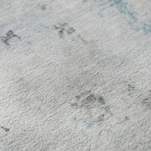 Photo of Sky Blue Ivory And Gray Abstract Washable Area Rug With UV Protection