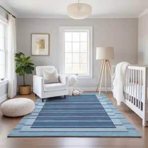 Photo of Sky Blue Ivory And Navy Blue Striped Washable Area Rug With UV Protection