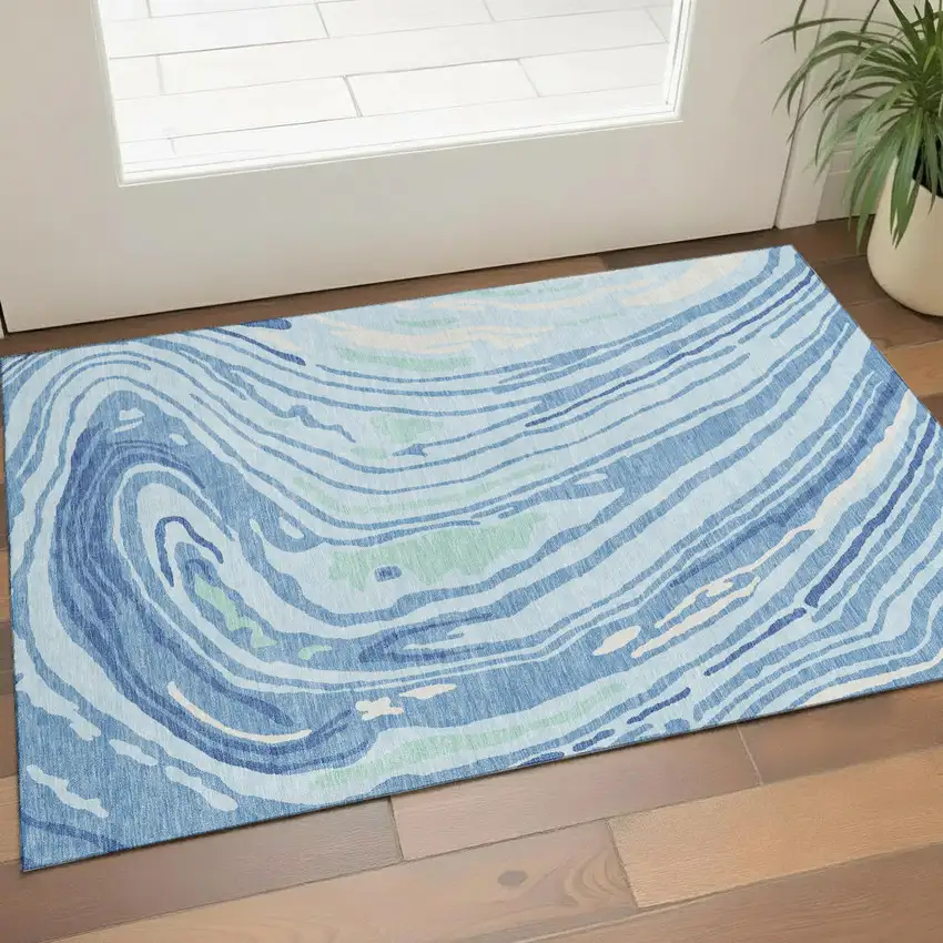 Sky Blue Ivory And Sage Abstract Washable Area Rug With UV Protection Photo 1