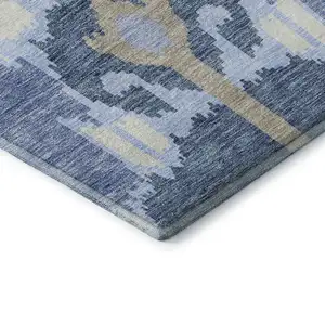 Photo of Sky Blue Ivory And Tan Ikat Washable Area Rug With UV Protection
