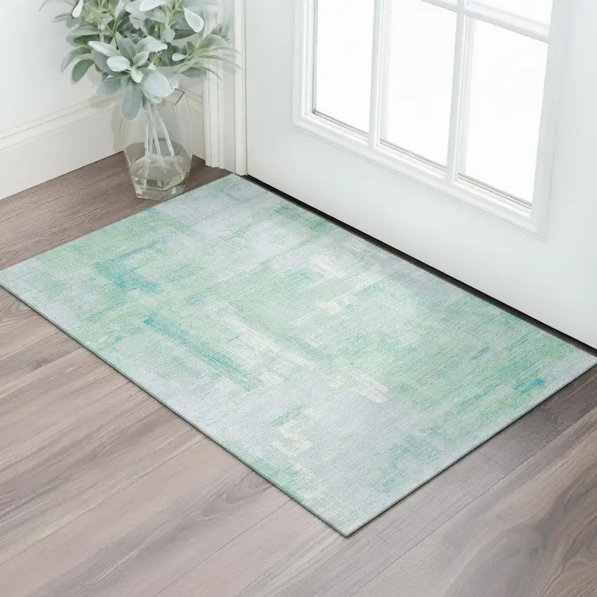 Sky Blue Ivory And Teal Abstract Washable Area Rug With UV Protection Photo 2