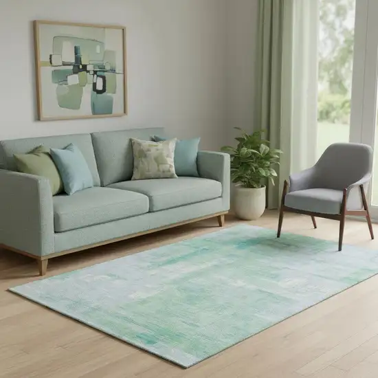 Sky Blue Ivory And Teal Abstract Washable Area Rug With UV Protection Photo 1