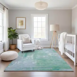 Photo of Sky Blue Ivory And Teal Abstract Washable Area Rug With UV Protection