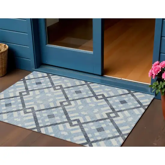 Sky Blue Navy Blue And Ivory Geometric Washable Indoor Outdoor Area Rug Photo 1