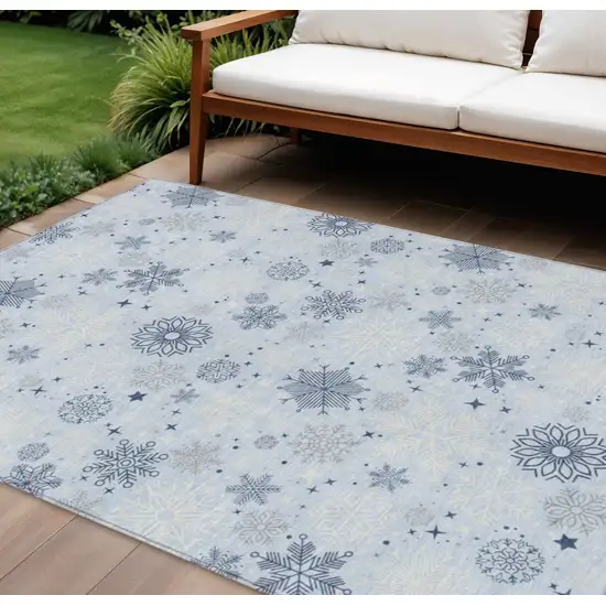 Sky Blue Navy Blue And Ivory Snowflake Washable Indoor Outdoor Area Rug Photo 1