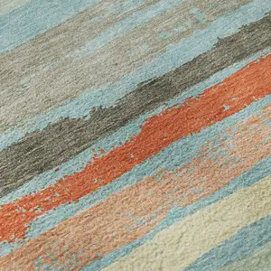 Photo of Sky Blue Orange And Ivory Striped Washable Area Rug With UV Protection