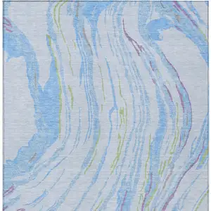 Photo of Sky Blue Purple And Green Abstract Washable Indoor Outdoor Area Rug
