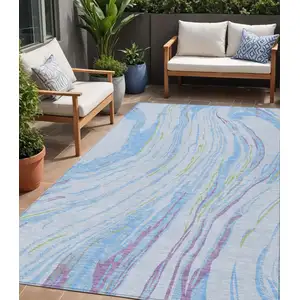 Photo of Sky Blue Purple And Green Abstract Washable Indoor Outdoor Area Rug