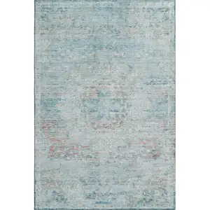 Photo of Sky Blue Teal And Blush Floral Medallion Washable Area Rug With UV Protection