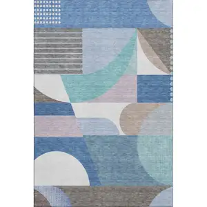 Photo of Sky Blue Teal And Ivory Geometric Washable Area Rug With UV Protection