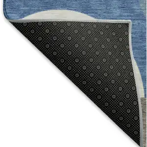 Photo of Sky Blue Teal And Ivory Geometric Washable Area Rug With UV Protection