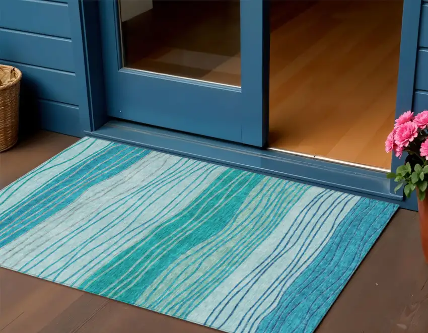 Sky Blue Teal Blue And Aqua Striped Washable Indoor Outdoor Area Rug Photo 1