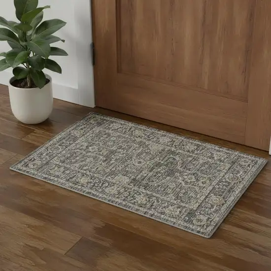 Slate Gray Brown And Ivory Floral Distressed Area Rug With Fringe Photo 1