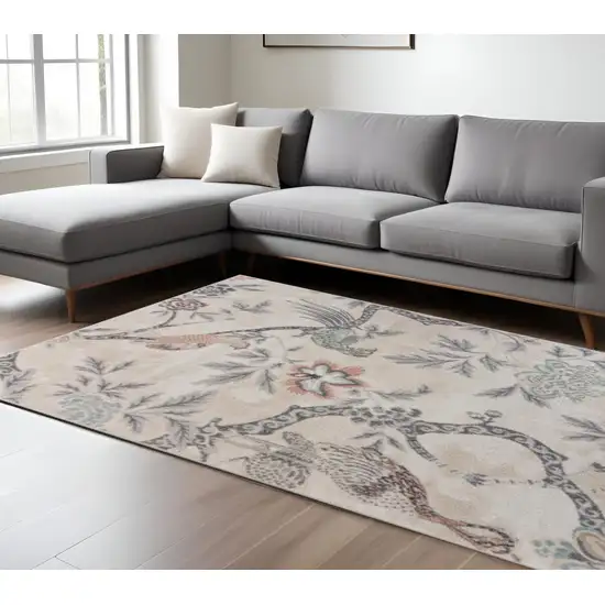 Soft Beige Birds and Trees Area Rug Photo 1