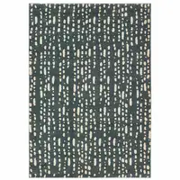 Photo of Steel Blue And Ivory Abstract Power Loom Stain Resistant Area Rug