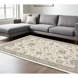 Photo of Stone Grey Ivory Green Brown Teal And Light Blue Oriental Power Loom Stain Resistant Area Rug