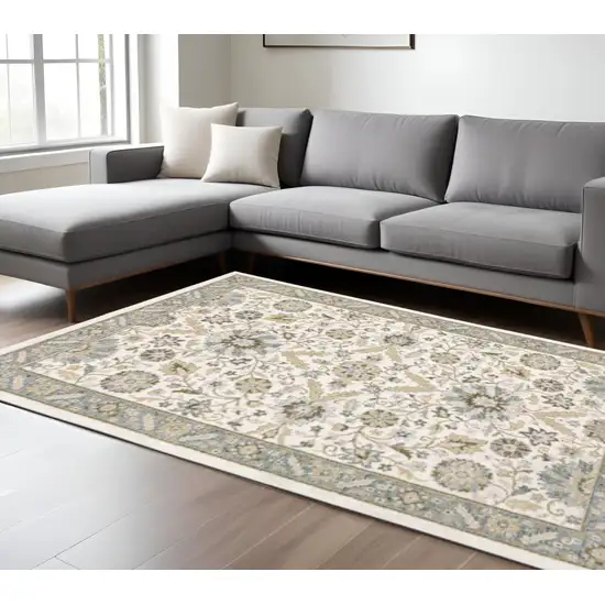 Gray and Ivory Oriental Power Loom Area Rug Photo 1